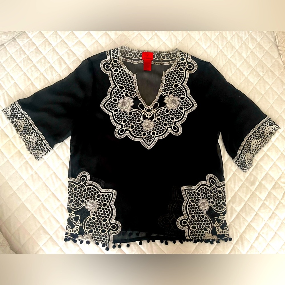 Sheer Black V Cristina top with white embroidered details size Large.